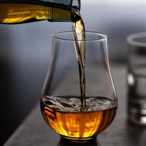 Pouring,In,Tulip-shaped,Tasting,Glass,Scotch,Single,Malt,Or,Blended Pouring,In,Tulip-shaped,Tasting,Glass,Scotch,Single,Malt,Or,Blended